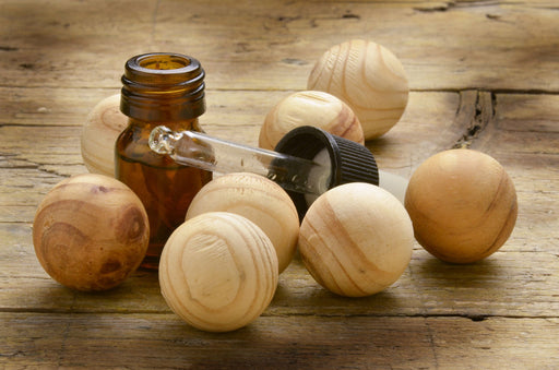 cedar balls with essential oil and dropper