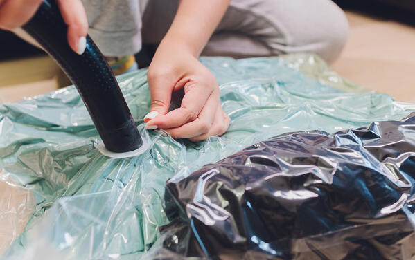 items being vacuum packed in a storage bag