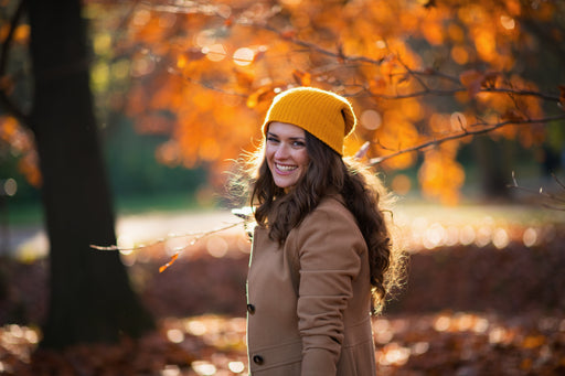 a beautiful woman in a beanie