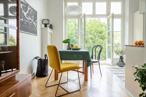 an apartment being aired with the doors open