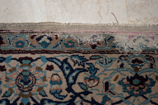 A moth-eaten antique carpet