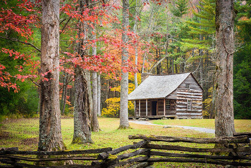 a log cabin in the woods