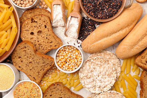 a selection of grains, pasta, flour and bread