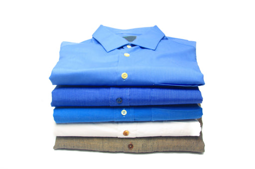 folded colored shirts